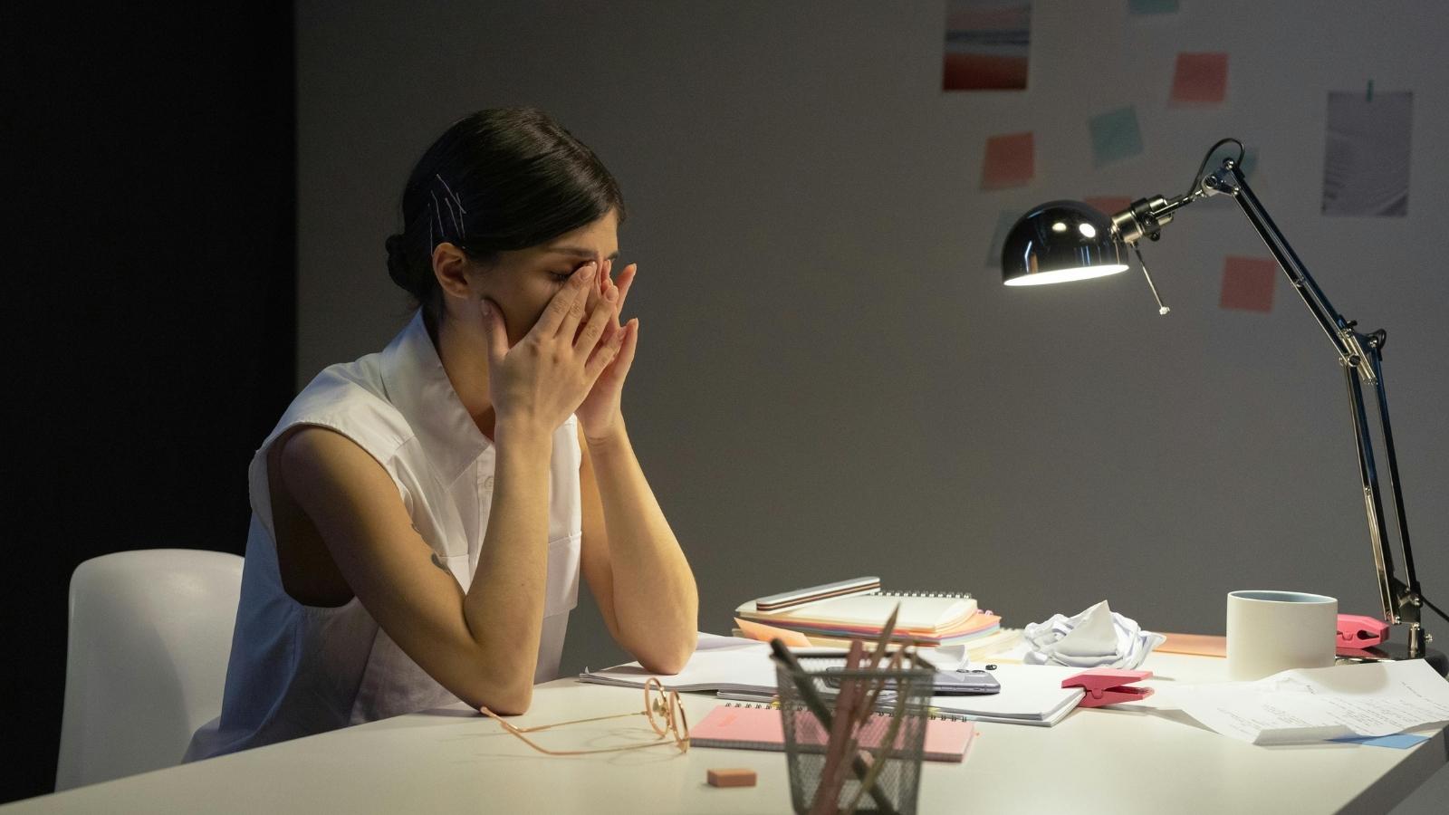 Woman Agrees to Extra Shifts After Repeated Pressure, Then Faces Guilt Trip When She Cancels Due to Burnout Stressed woman with hands over head