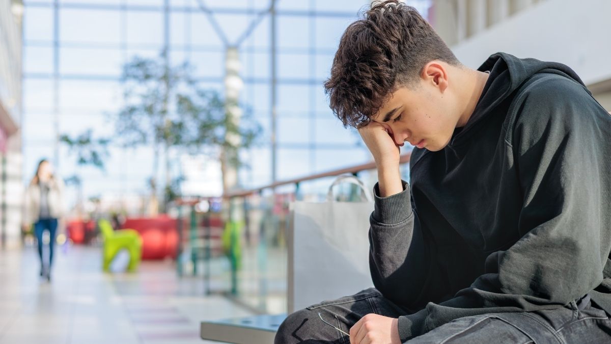 tired teen boy