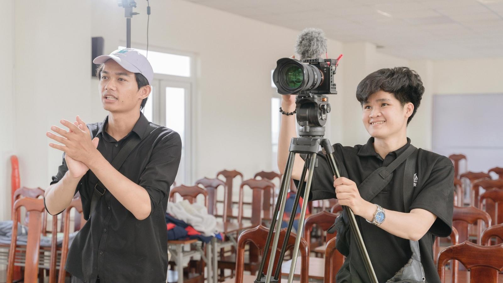 two film students operating a camera