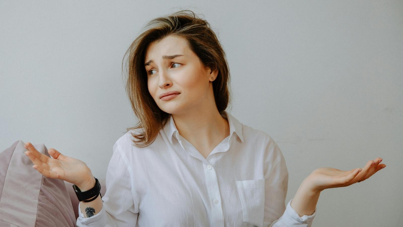 upset woman shrugging