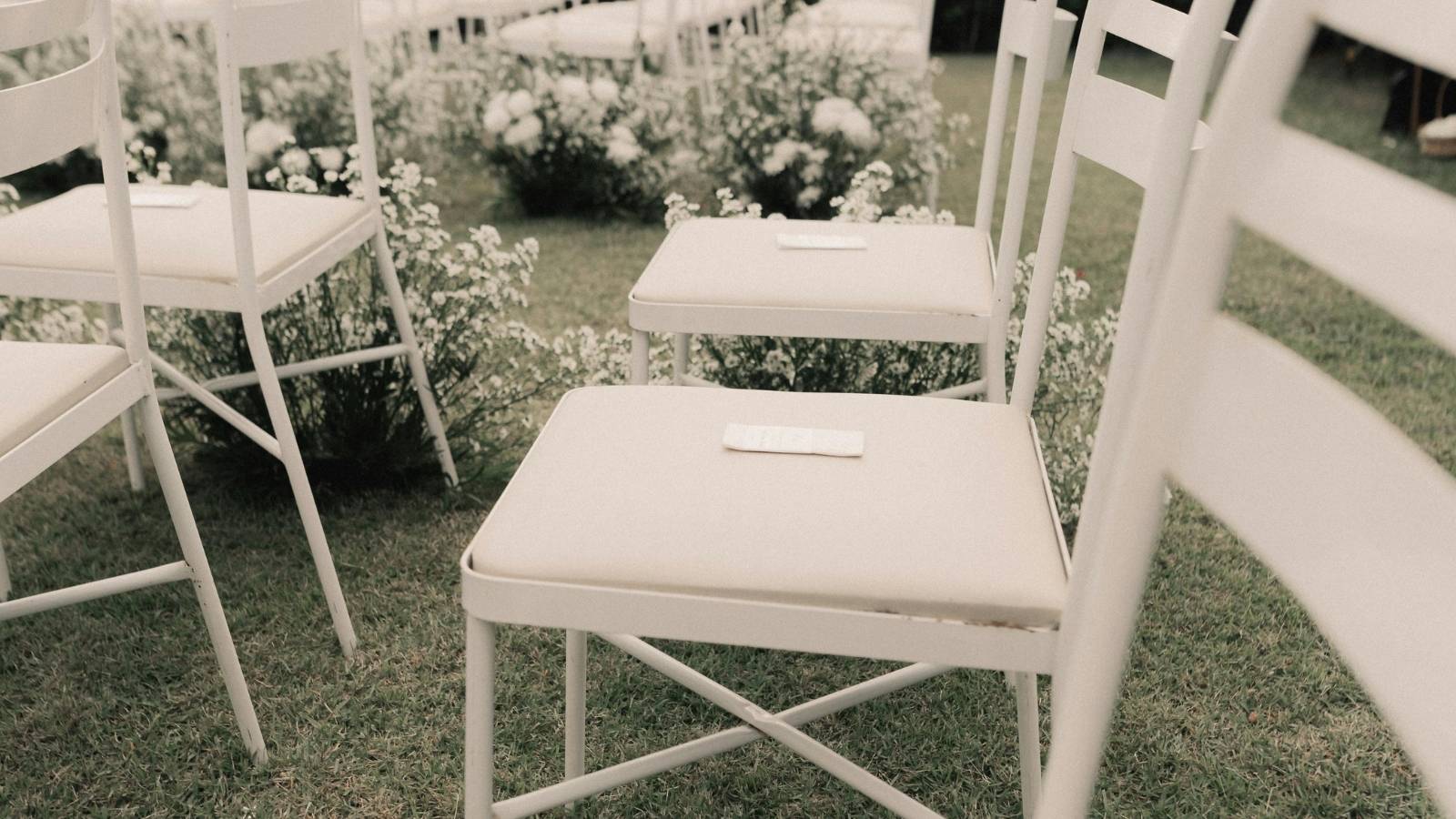 wedding chairs set up for guests at outdoor wedding