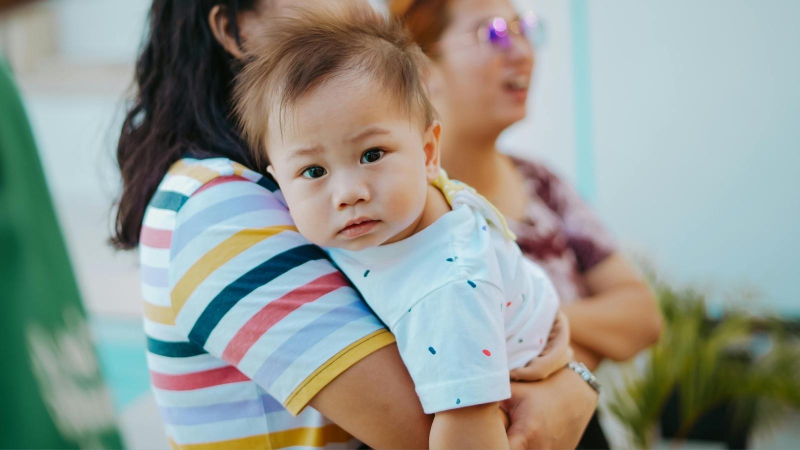 woman holding a baby