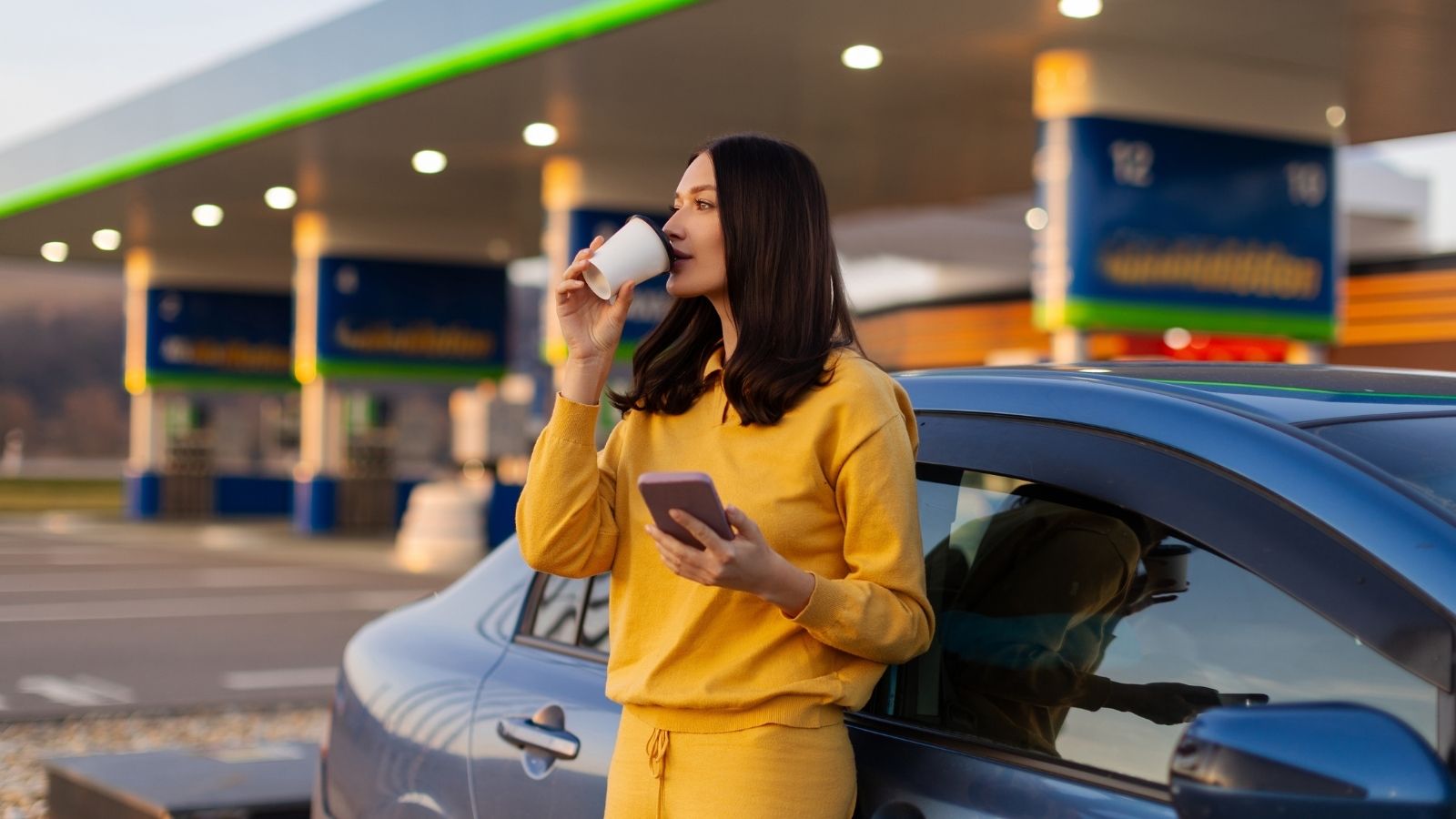 A Gas Station Standoff Ended With One Driver Paying for a Pump She Never Used — Because She Tried to Cut woman sipping coffee at gas station
