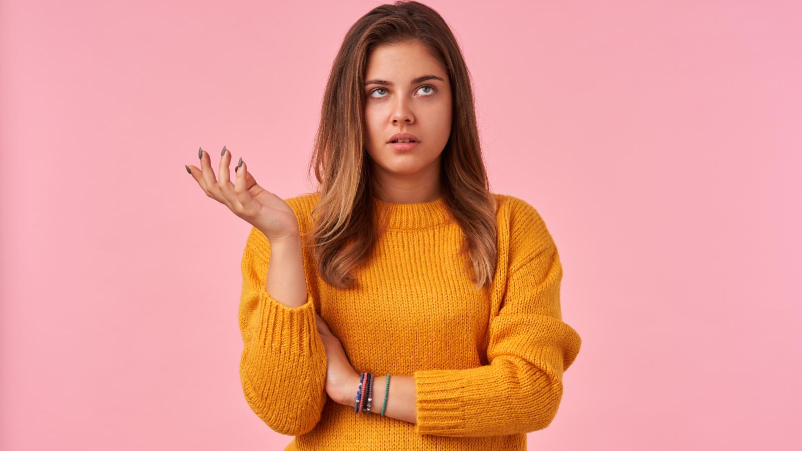 woman rolling her eyes