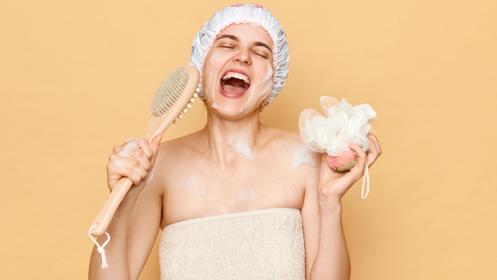 woman singing in a shower