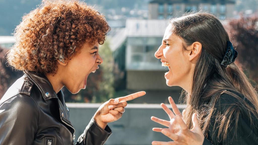 two women yelling at each other