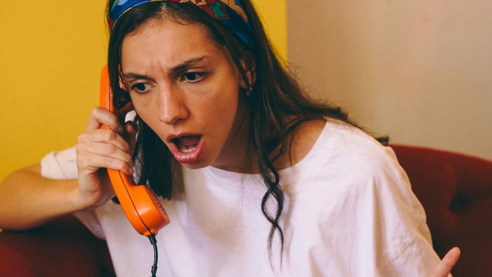 woman yelling into the phone