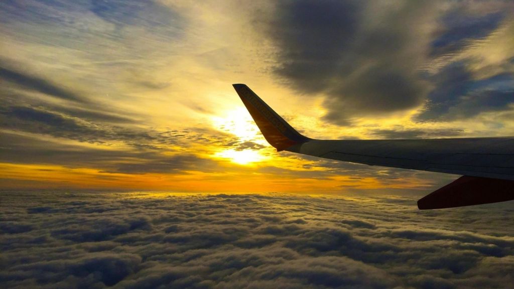 An airplane at sunset