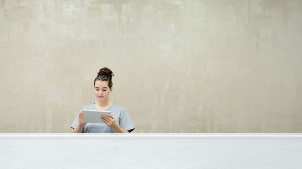 A woman working on reception