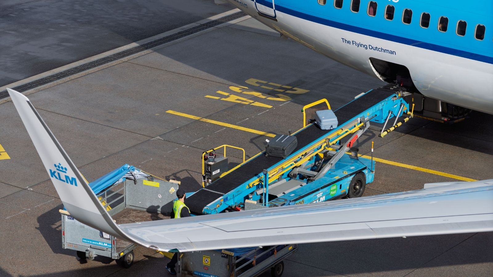 Luggage being loaded onto a plane