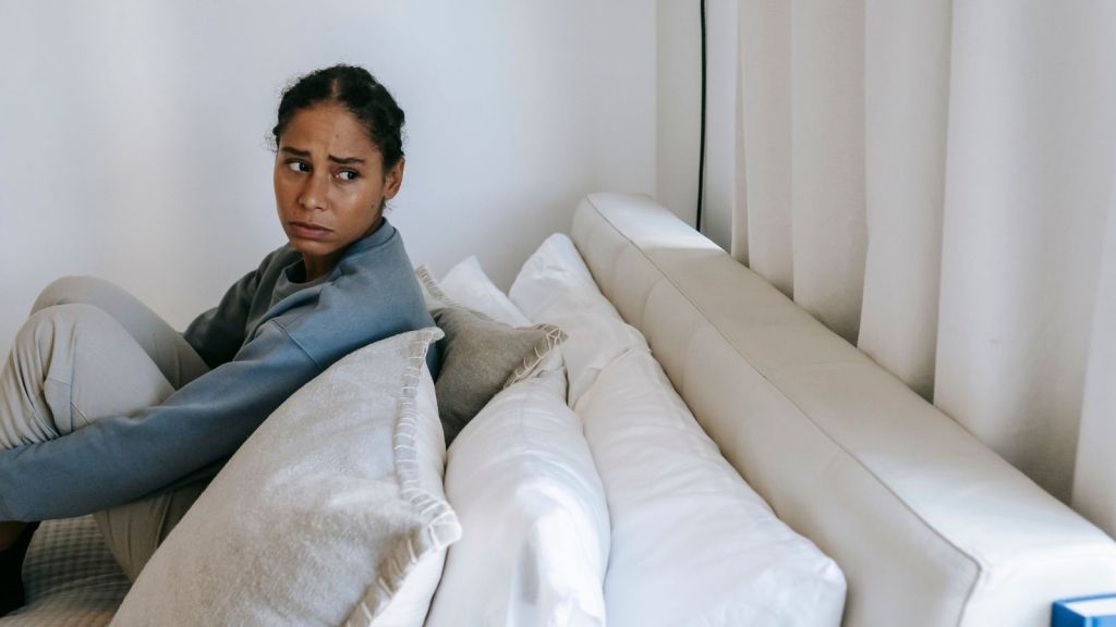 An upset woman looking over her shoulder