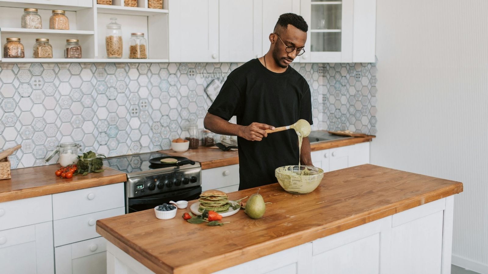 A man cooking in his kitchen