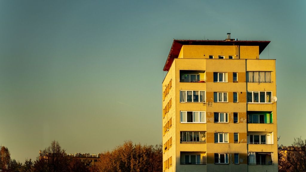 A yellow apartment block