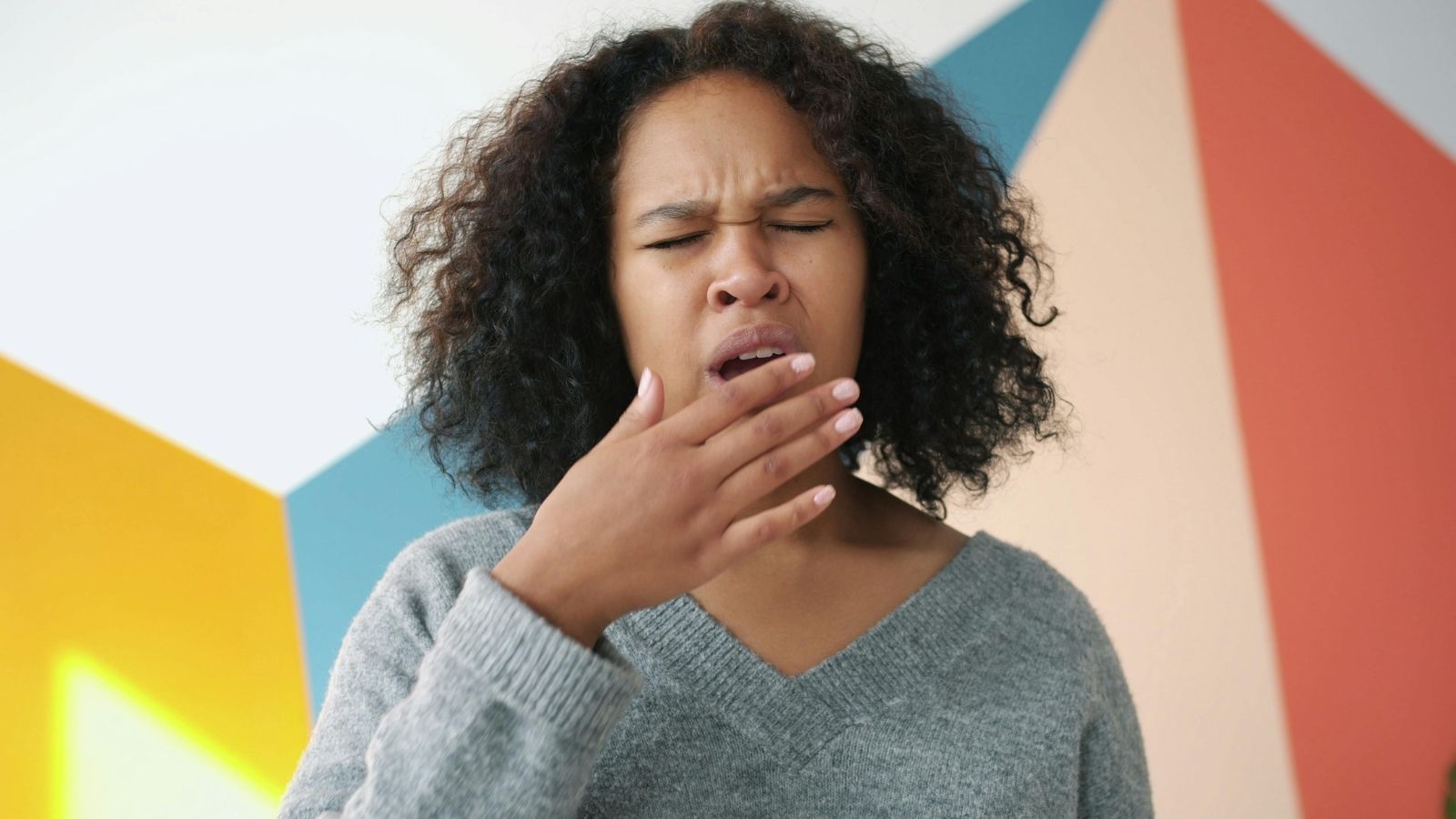 A woman yawning