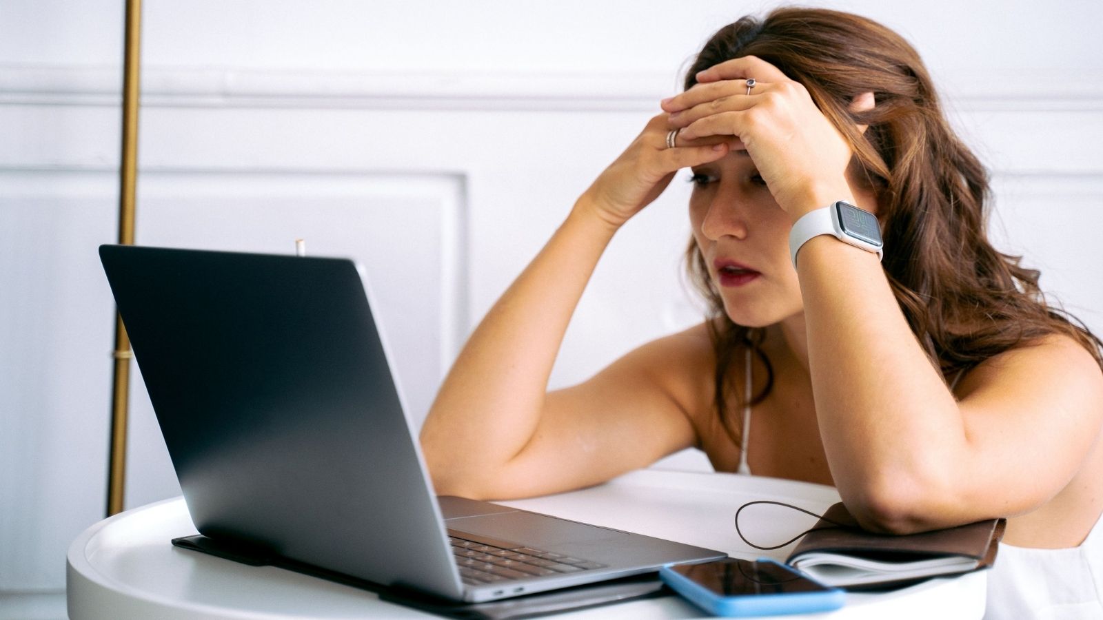 A Study Relationship Begins To Fray As One Friend Feels Overworked And Unappreciated A woman at her laptop with her head in her hands