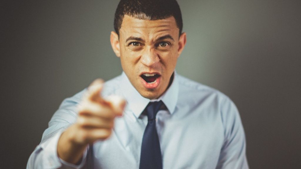 An angry man pointing