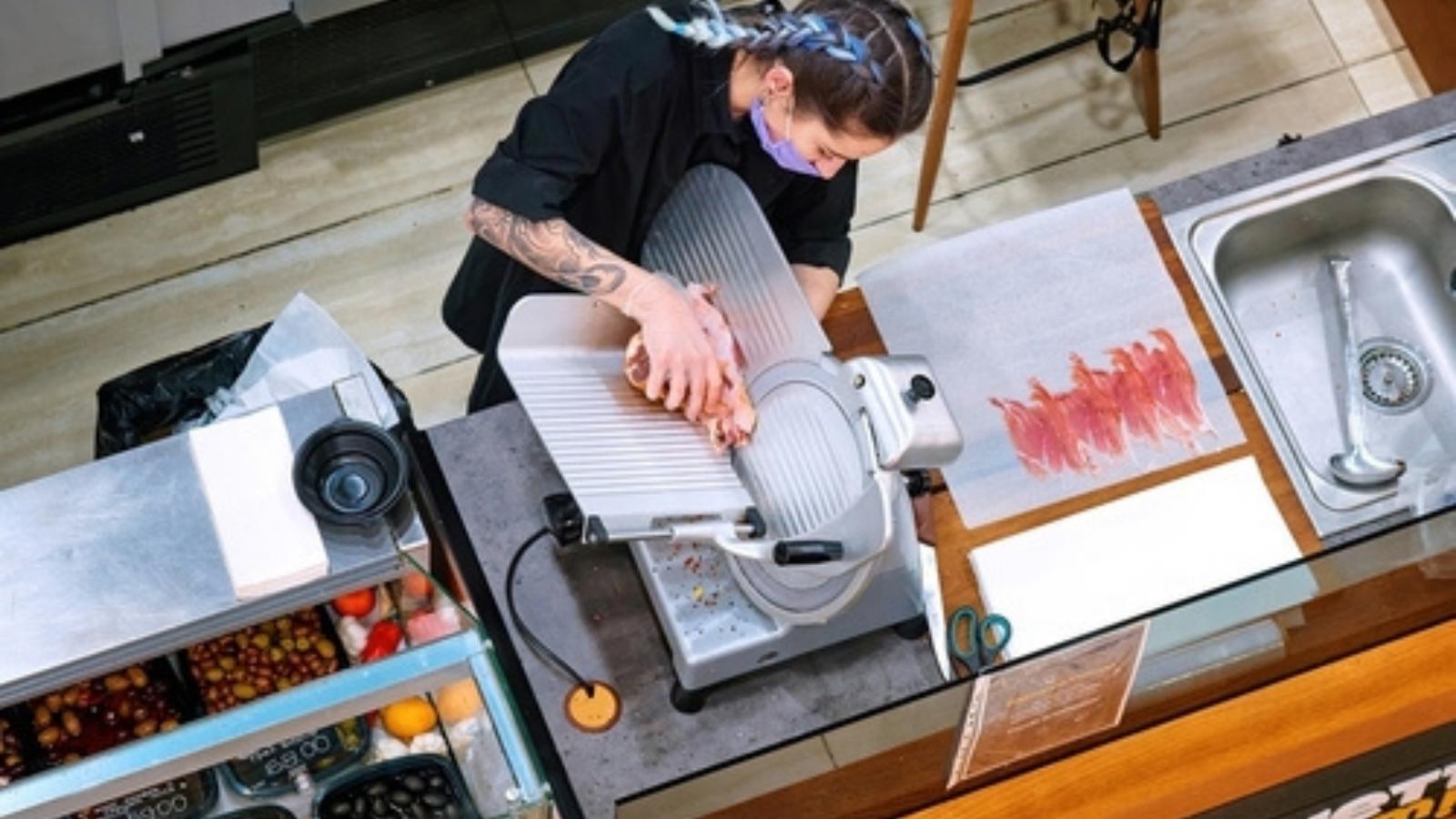 The Grocery Store Trap: How a Simple Product Inquiry Escalated Into an Outrageous Request No Worker Could Ever Fulfill. Woman slicing meat