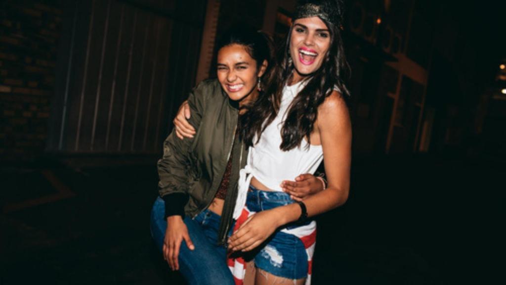 Two girls laughing
