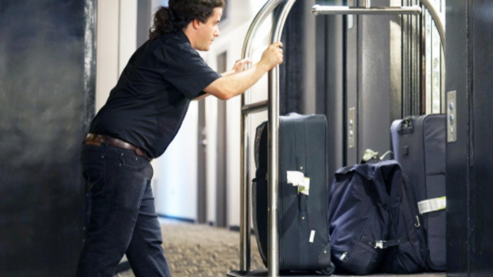 Guest Refuses to Accept That All Hotel Luggage Carts Are in Use and Demands Action Luggage rack