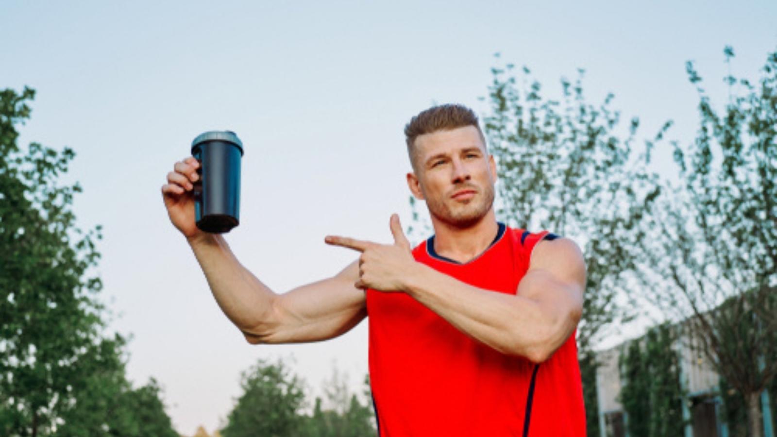 Man pointing at a cup