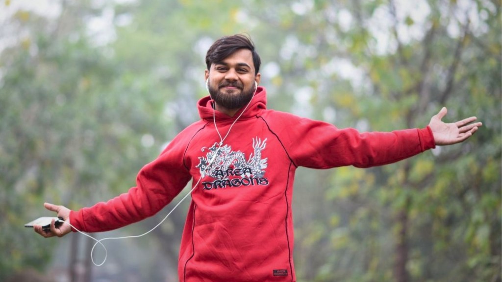 Man wearing a red hoodie outside