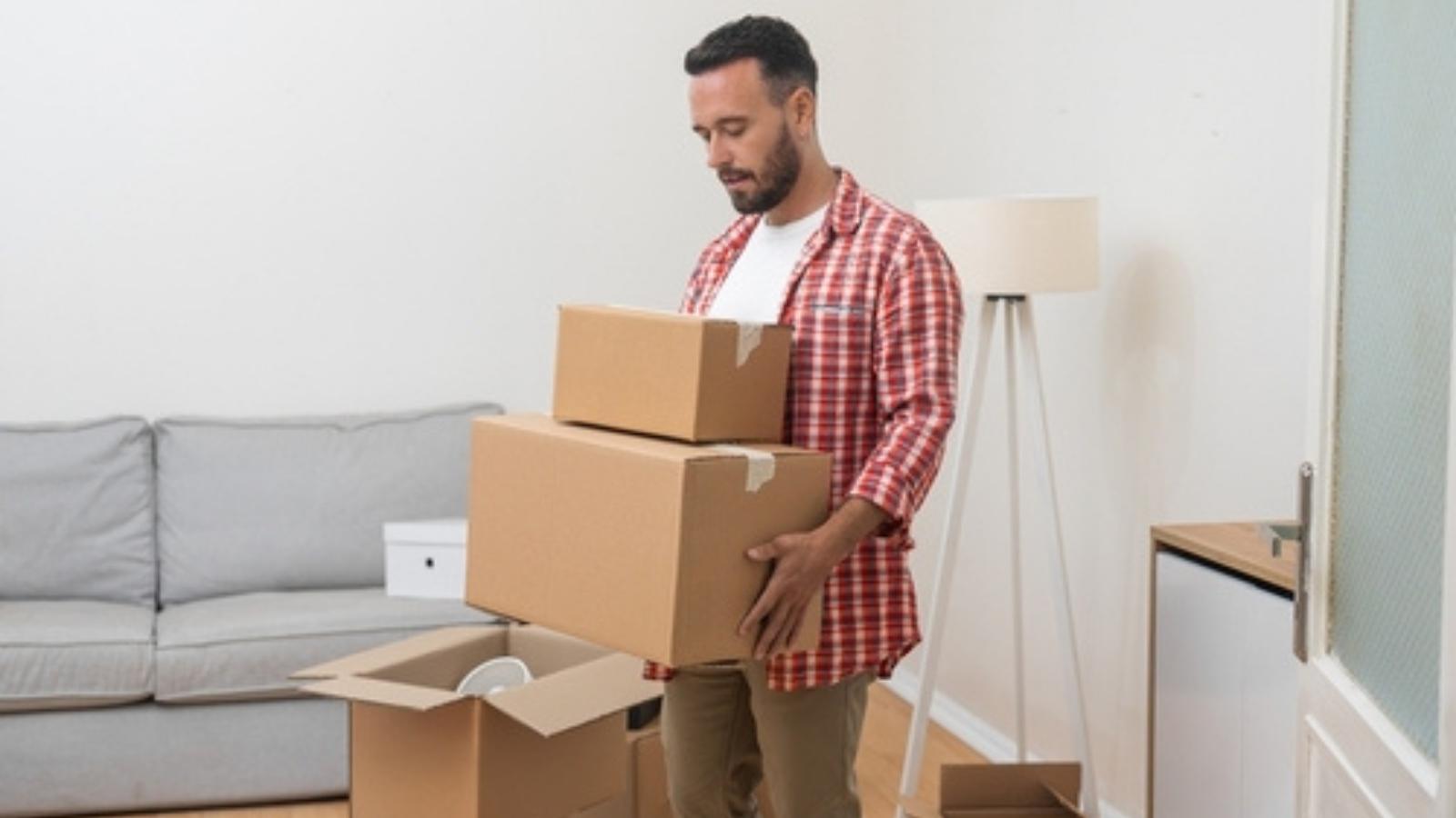 Man packing to move