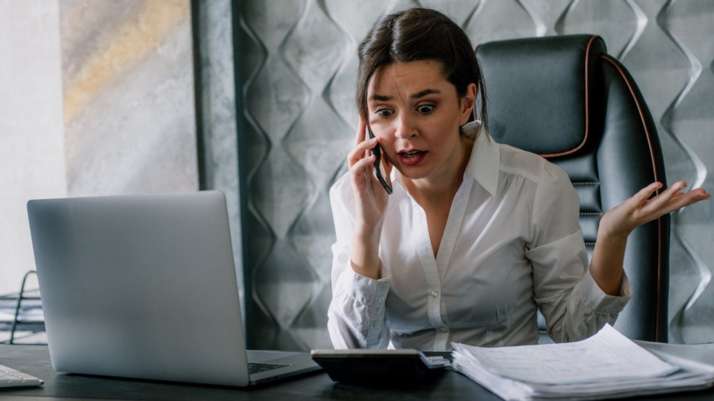 Female receptionist talking on the phone