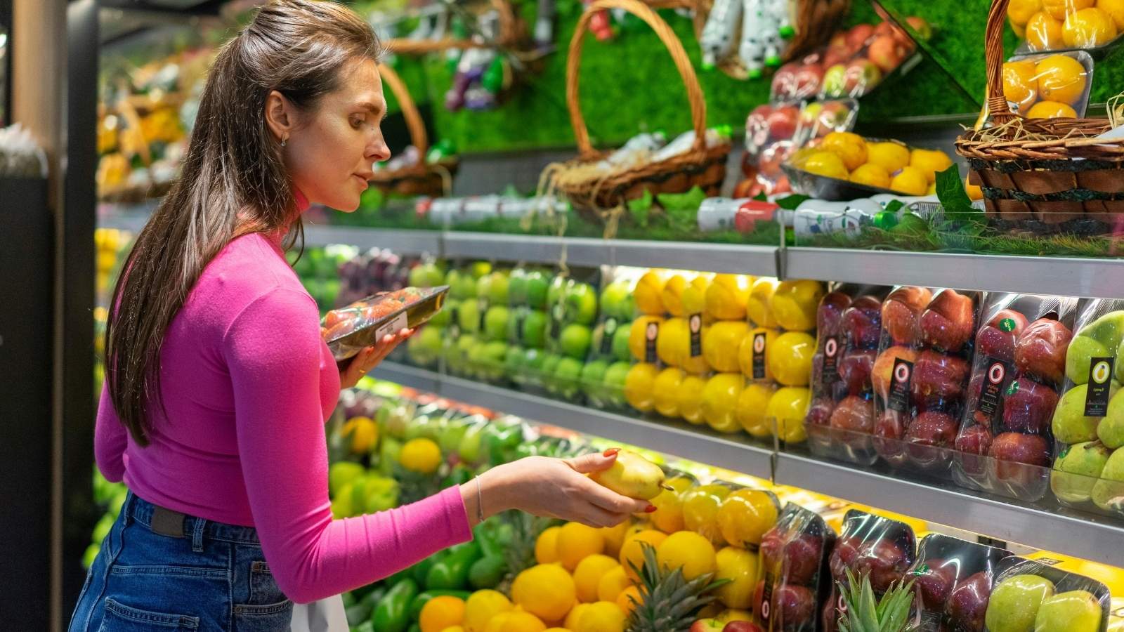 Grocery Store Supervisor Goes Out of His Way to Help a Customer Find a Specific Kombucha, but She Takes Offense When He Suggests Another Store Woman shopping in the produce dept of a nice store