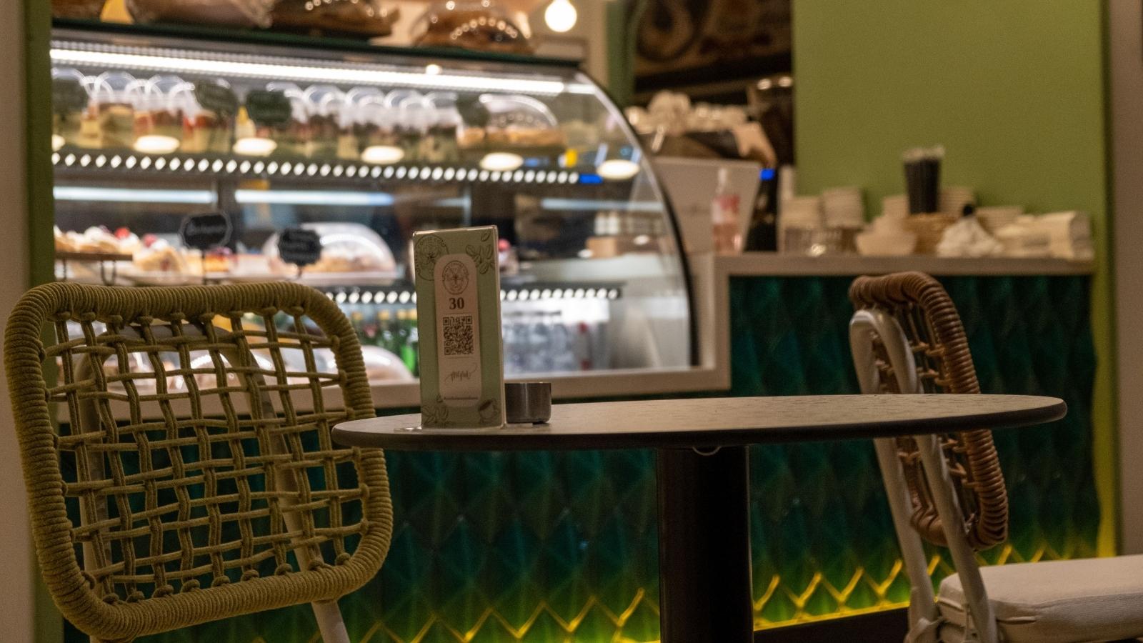 Small bakery with QR codes on the table