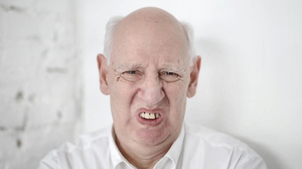 Old grouch man making a funny face