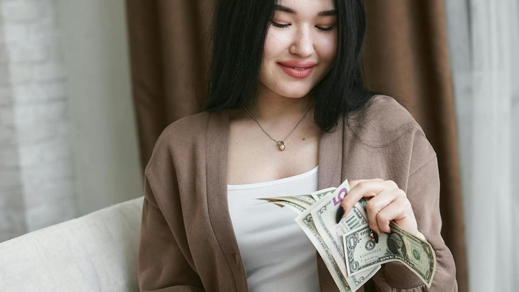 Woman counting her change from the cashier