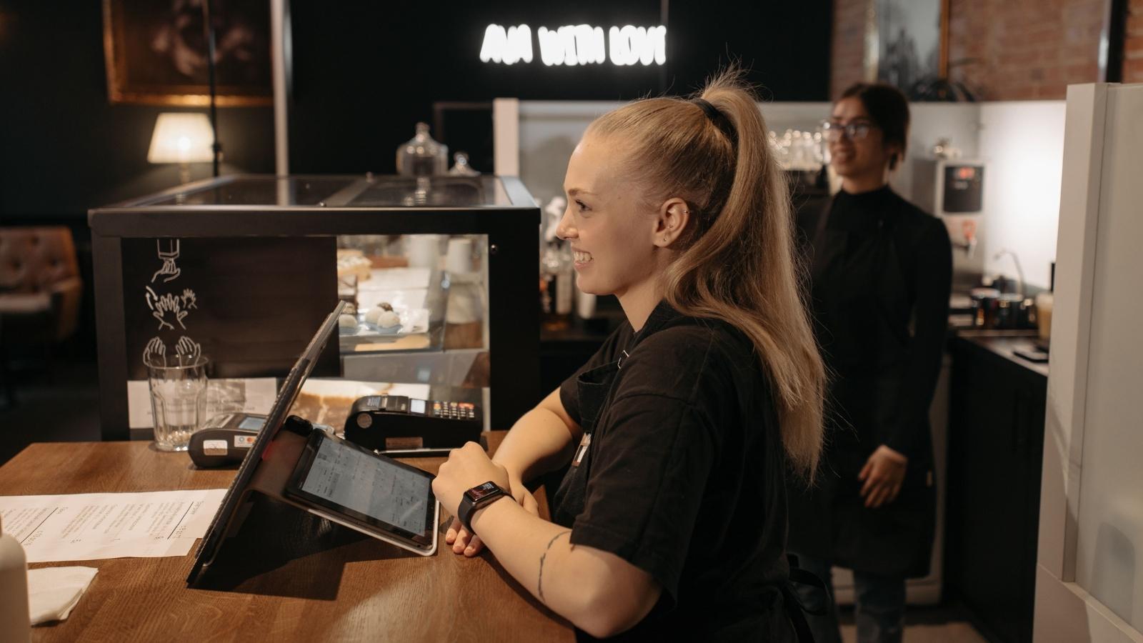 Coffee Shop Customers Warn Baristas About Man Who Appears to Be Secretly Recording Them Two women baristas working at a local coffee shop