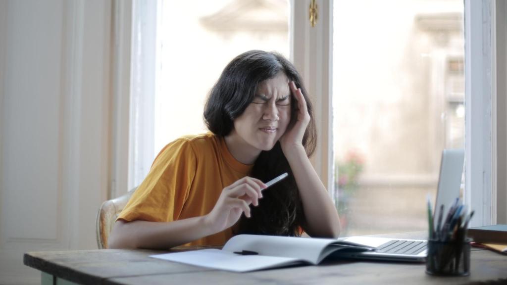 Woman making a stressed face