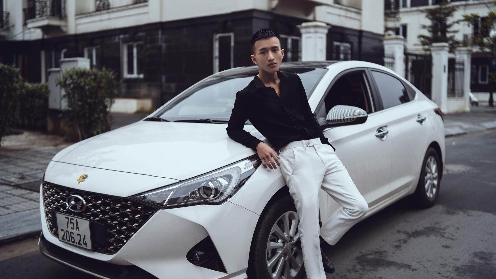 ‘You Profiled Me!’: Photographer Cornered by Stranger After Hiding $2,000 Lens in Trunk Asian man standing against his car