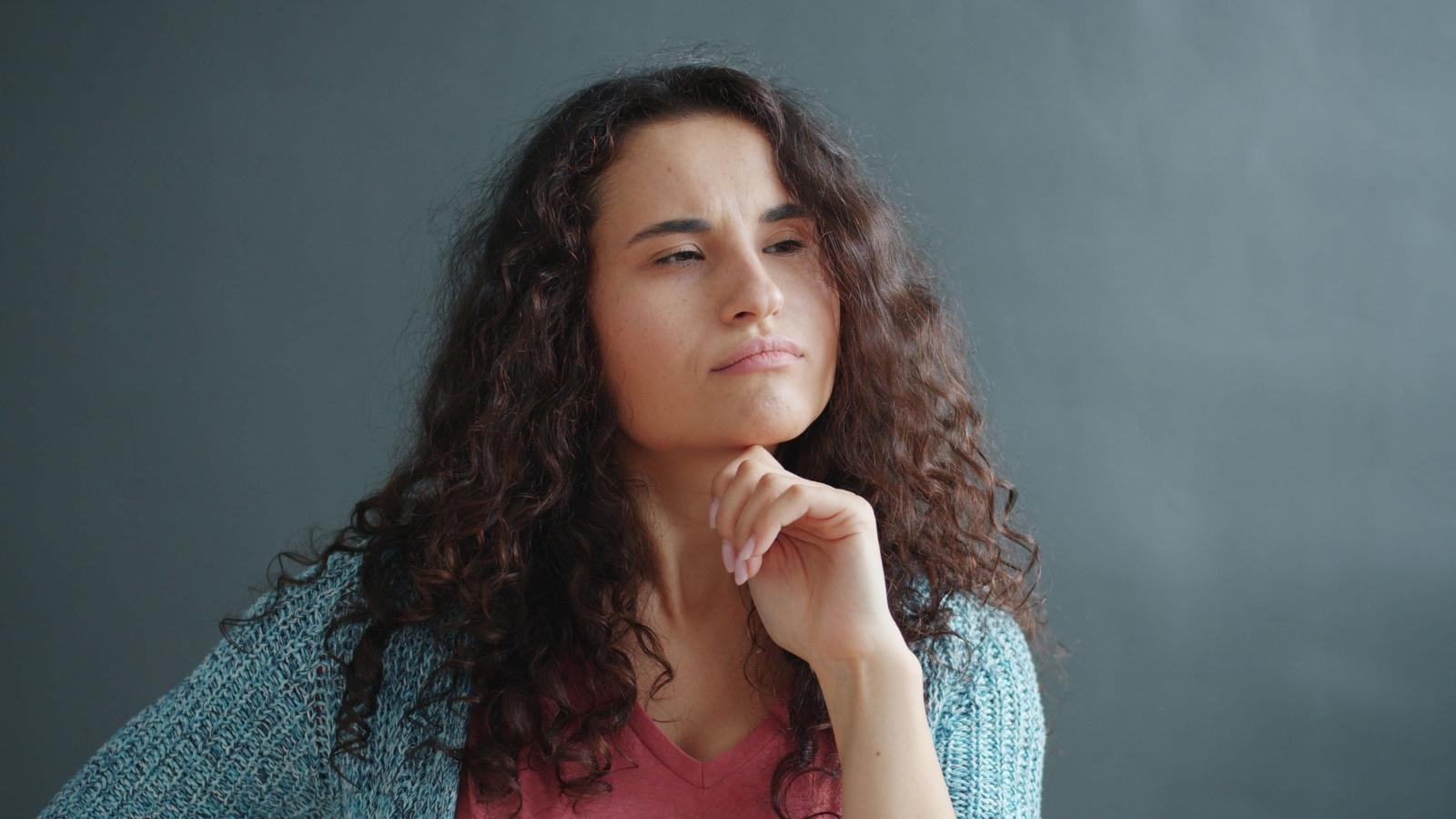 Woman thinking about what to do next.