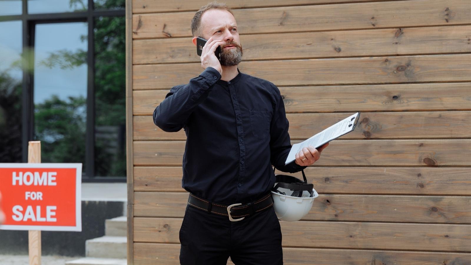 Handyman employee on the phone making an appt
