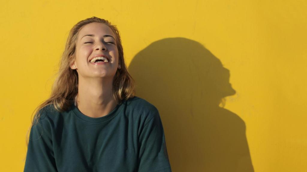 Woman laughing at a joke