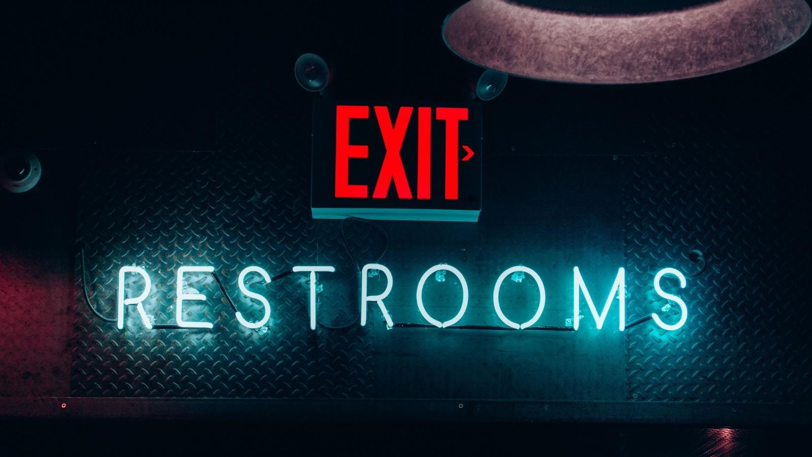 Her New Friend Refuses to Clean Up in Public Restrooms — She Decided to Show Her Exactly How That Feels Exit sign for those leaving the restroom