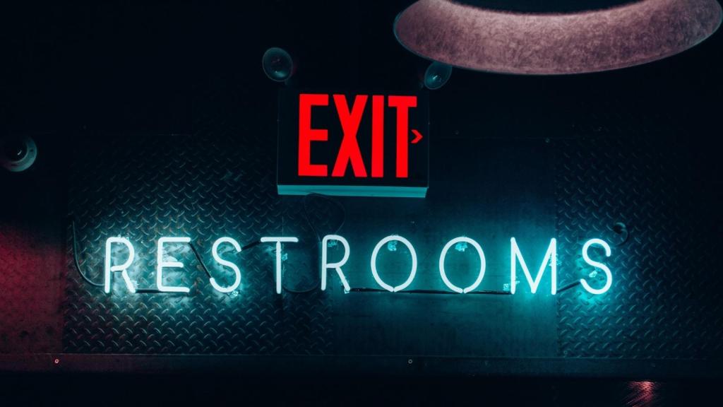 Exit sign for those leaving the restroom