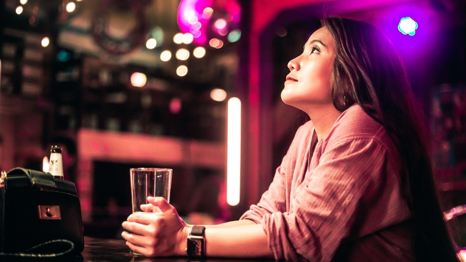 Young Woman Struggles With Guilt After Mother’s Late Cancer Diagnosis and Family Changes Woman having a drink and thinking
