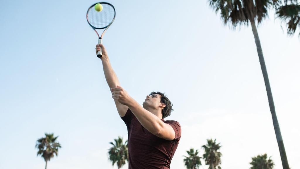 Young man playing tennis