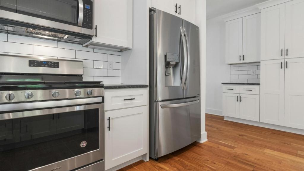 New fridge standing in the kitchen
