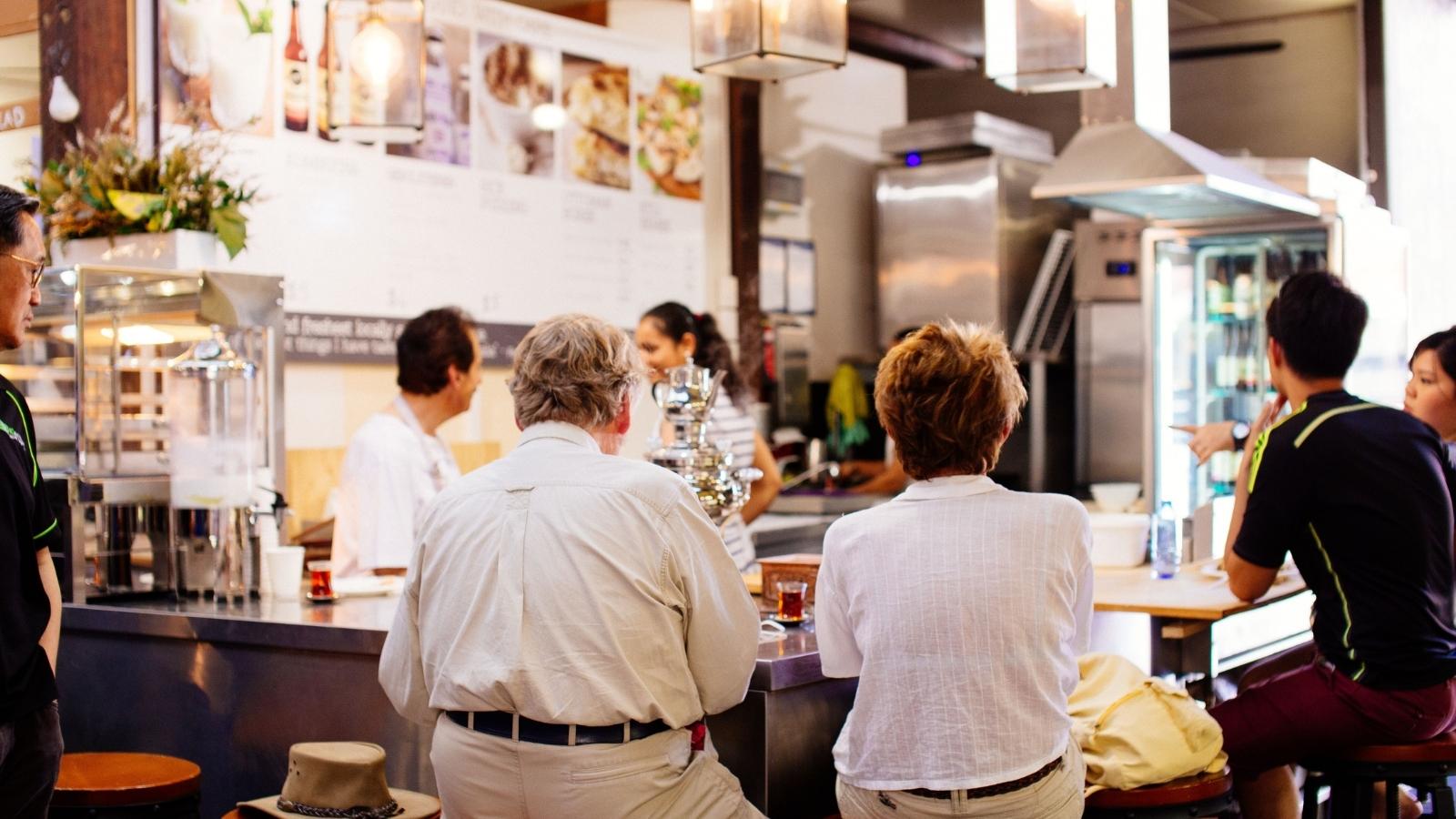Restaurant Server Watches Baseball Team Ignore Wait and Seat Themselves, Leading to Manager Decision That Upsets Other Guests People eating at a busy restaurant