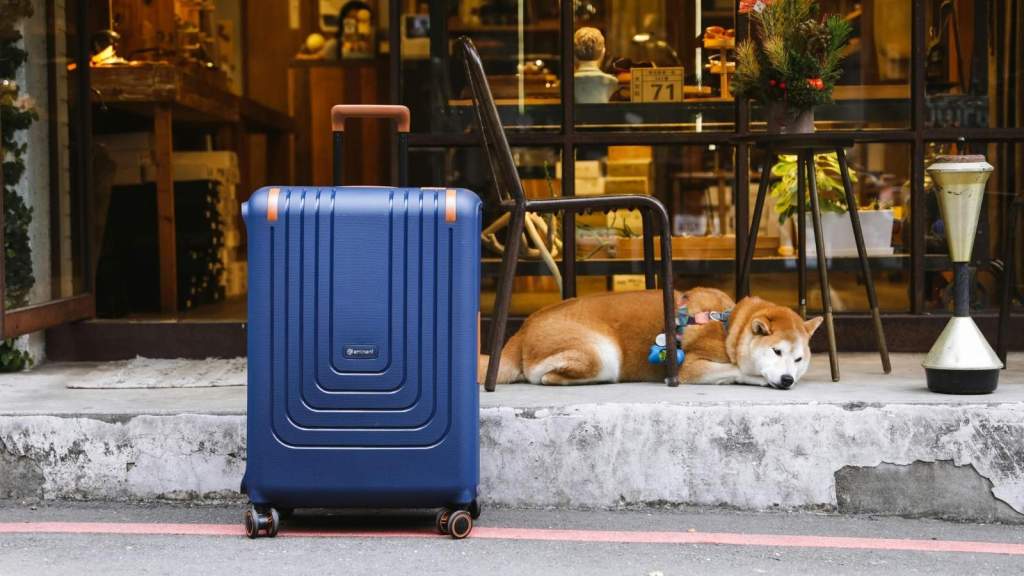 Blue luggage sitting unsupervised