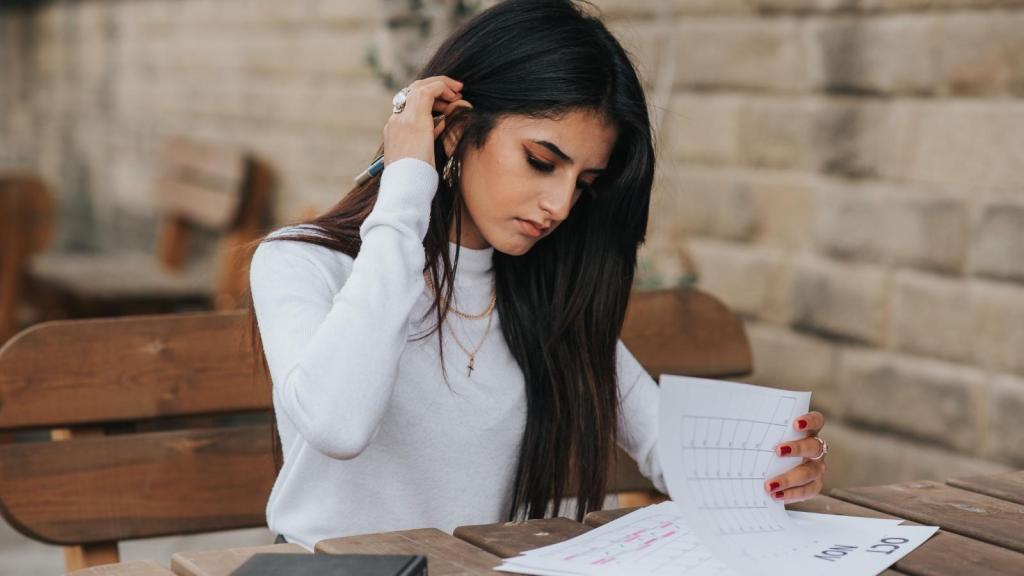 Woman figuring up her hours worked