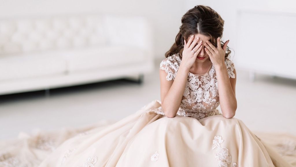 sad woman in a wedding dress