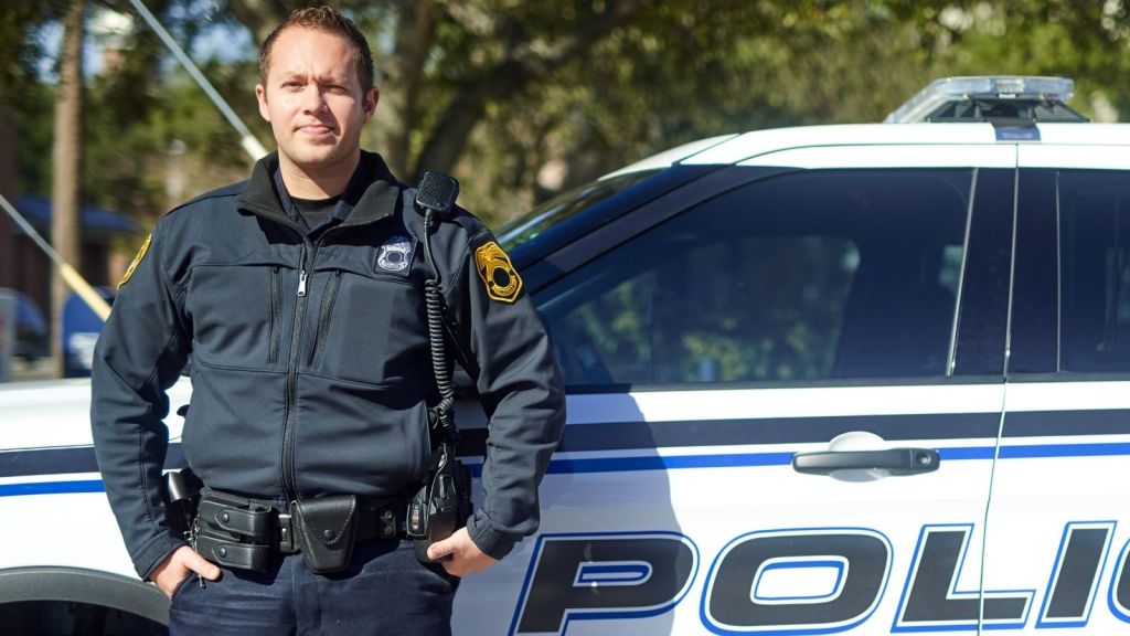 police officer standing outside his vehicle