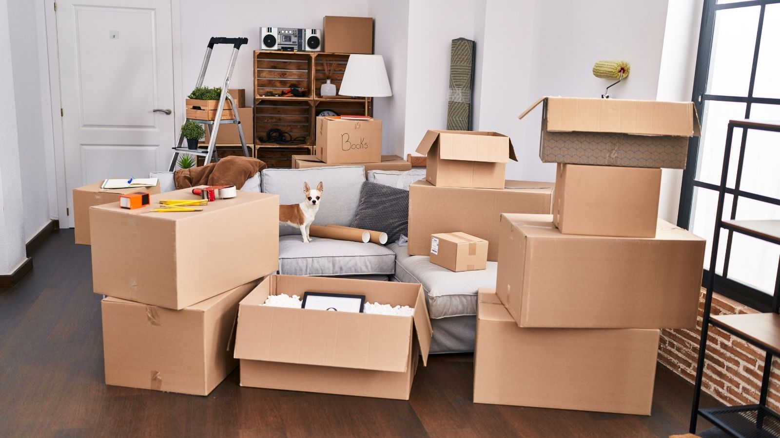 stack of moving boxes in an apartment