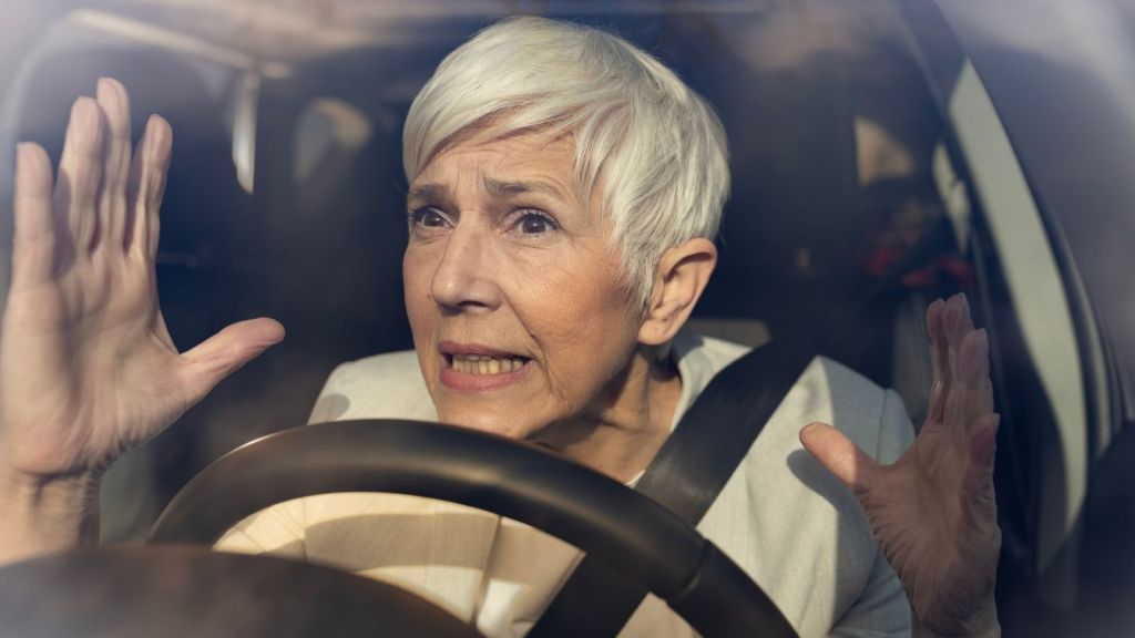 angry old lady in a car