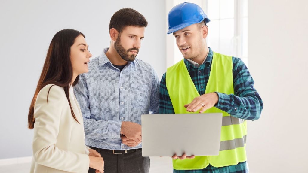 couple talking to a contractor